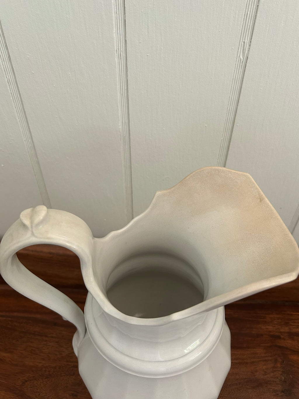 Antique white pitcher