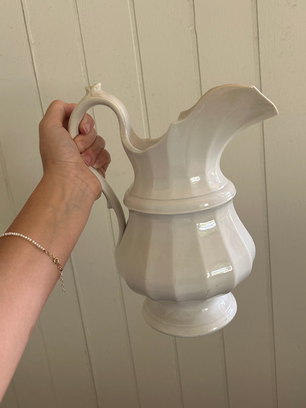 Antique white pitcher