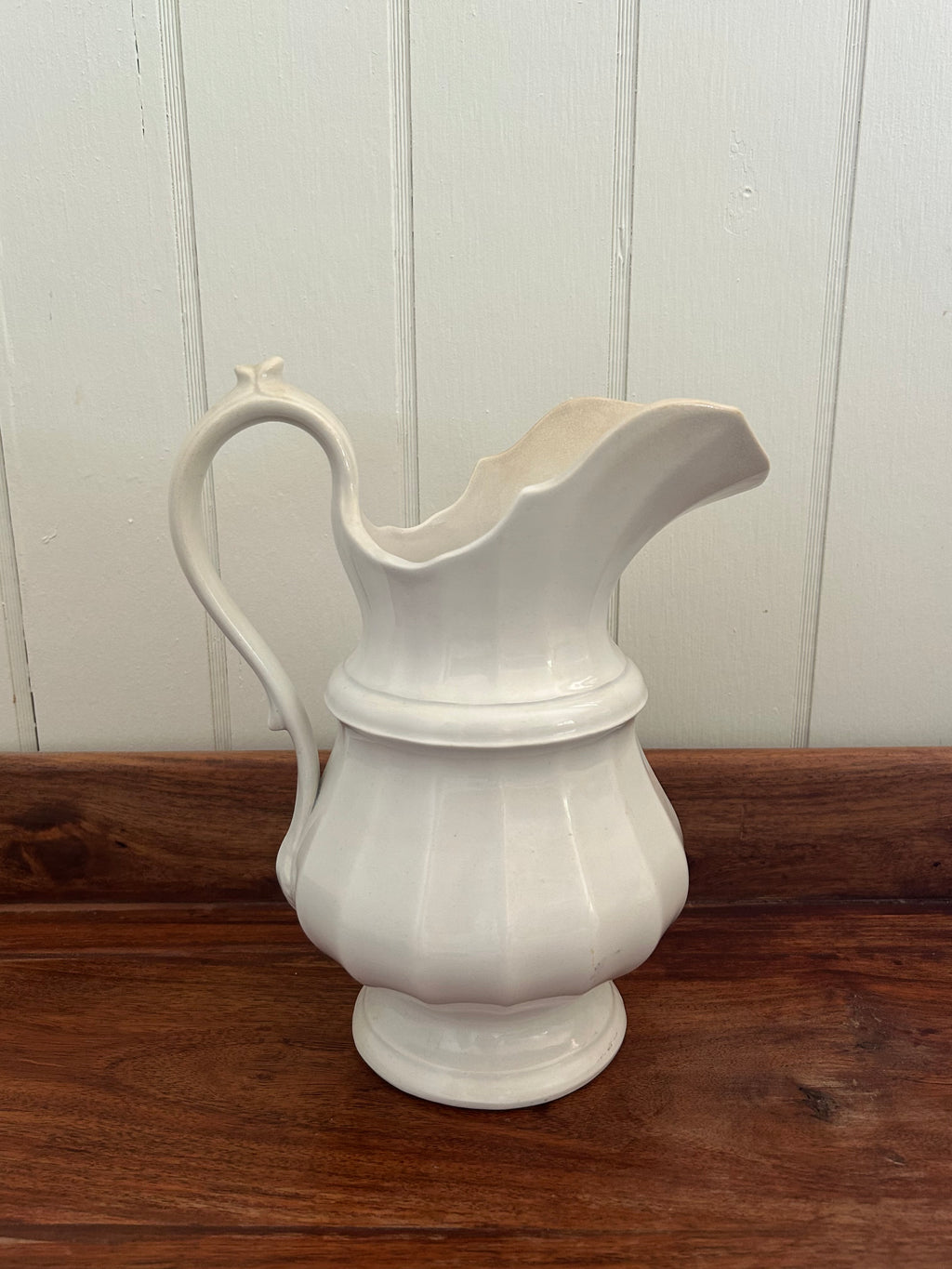 Antique white pitcher