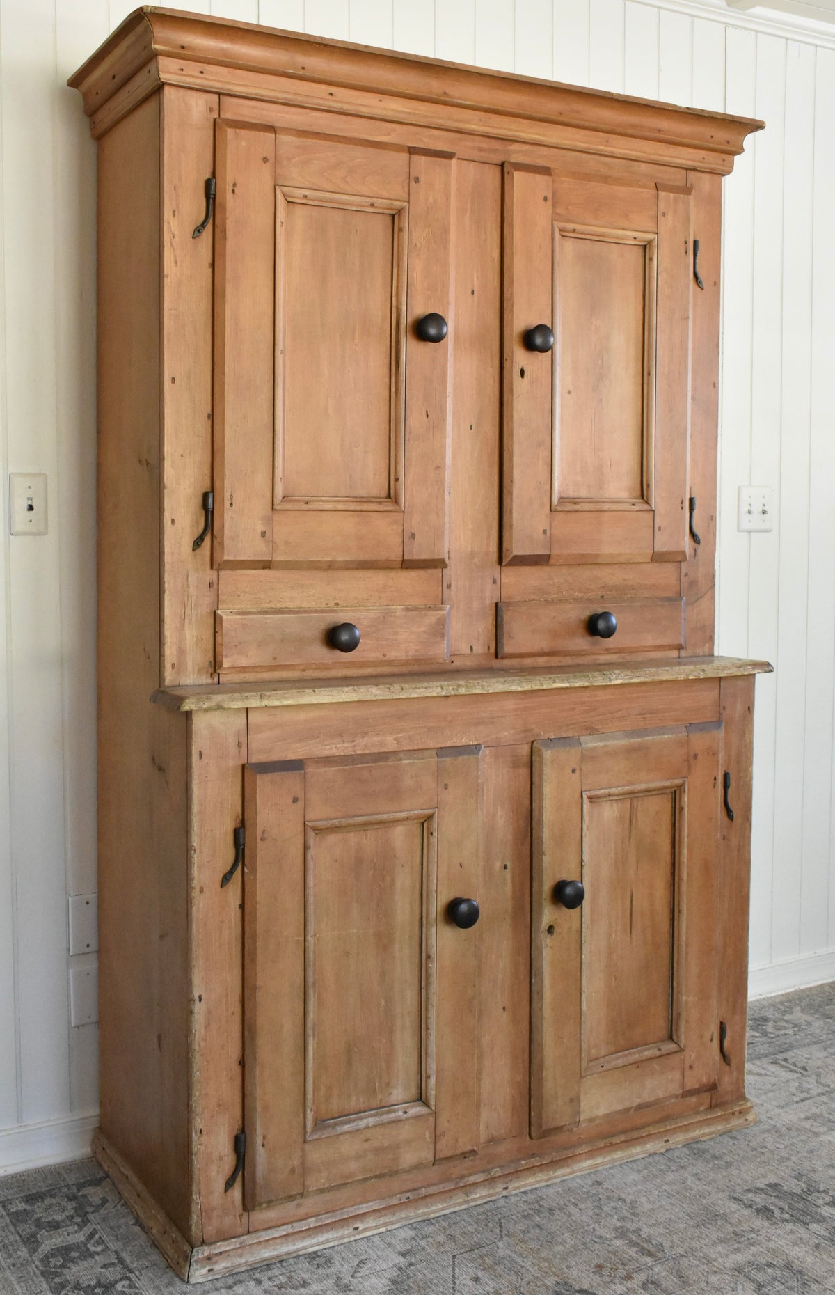 Early step back cabinet