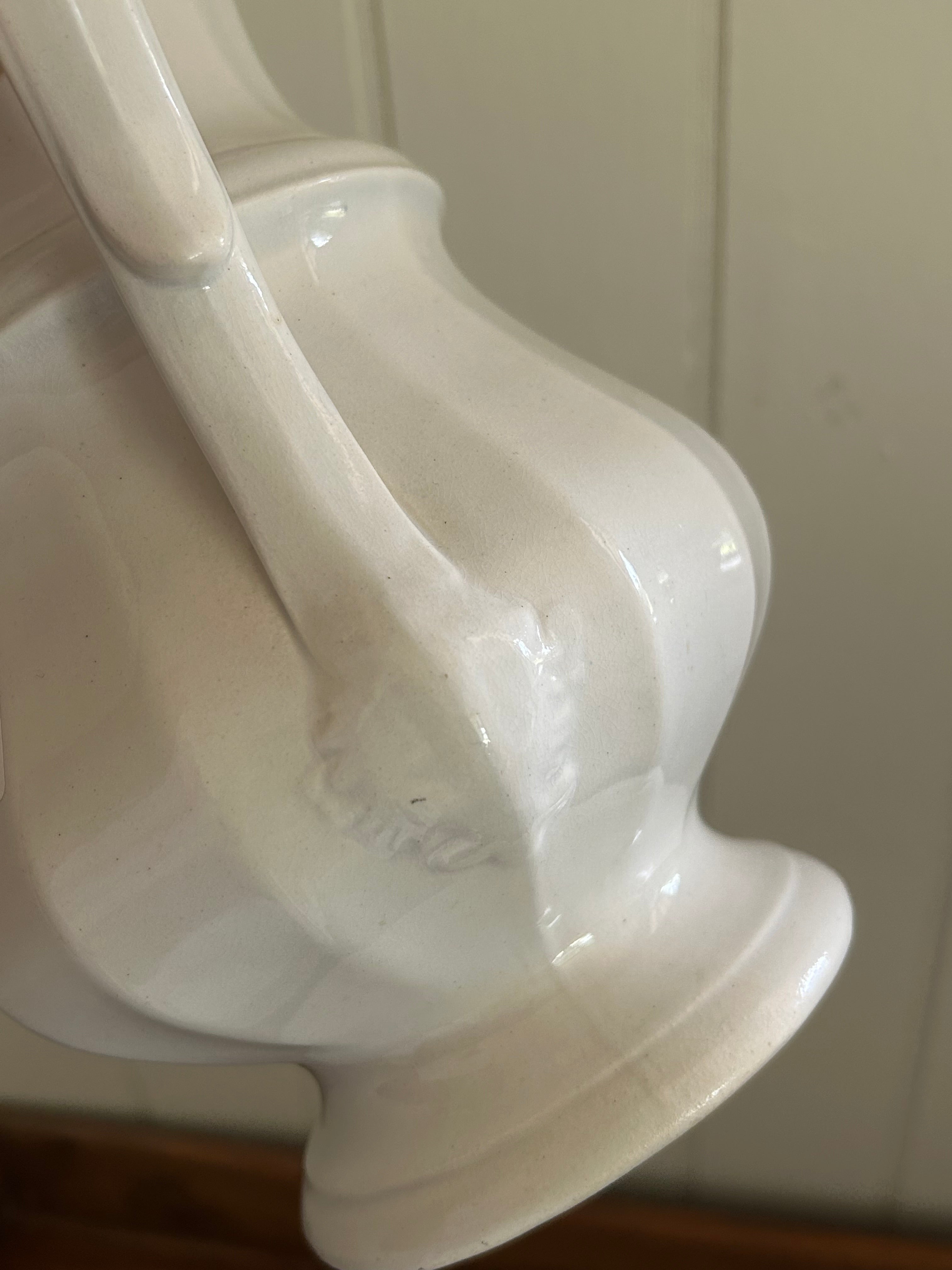 Antique white pitcher