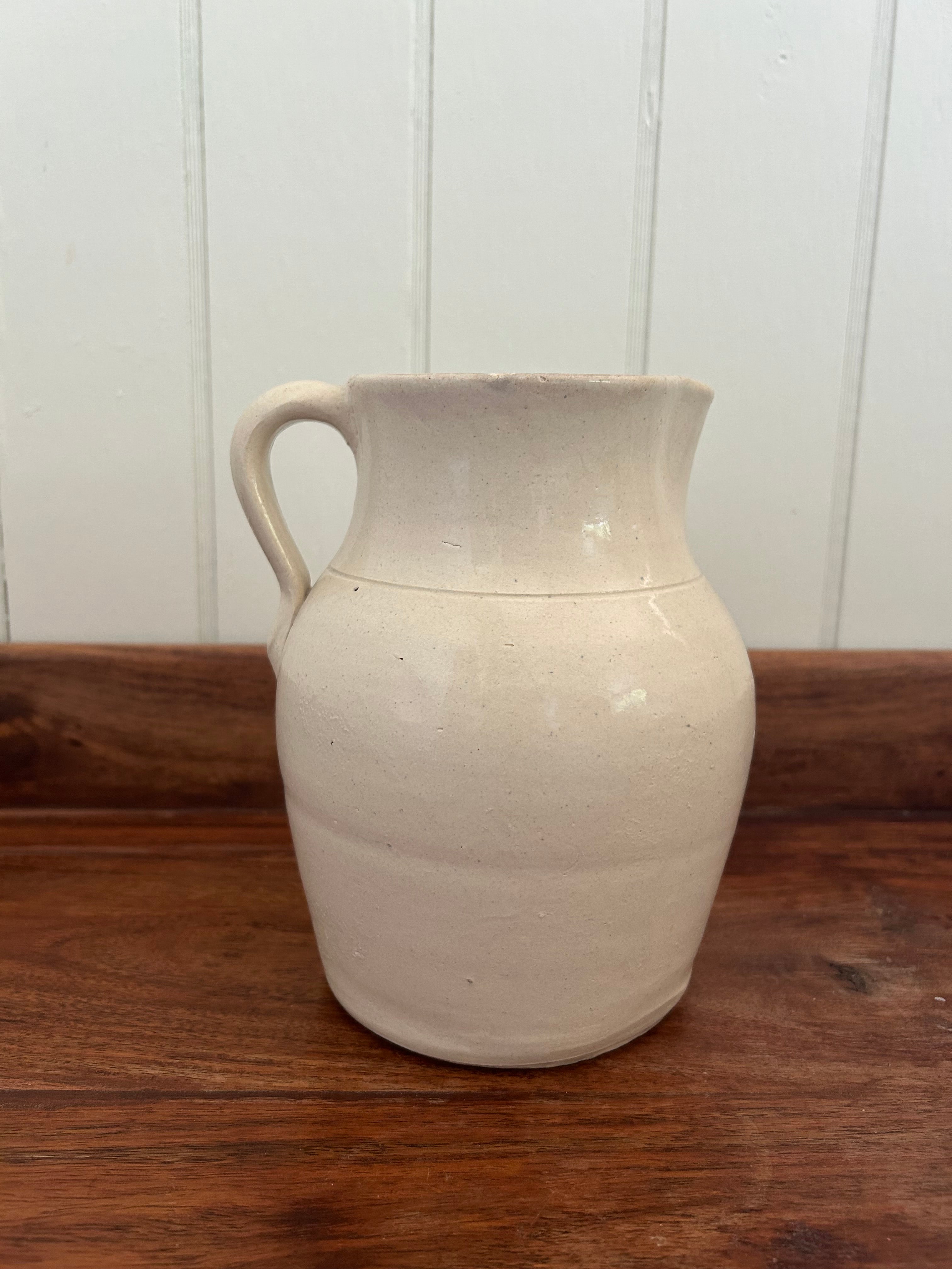 Cream crock pitcher